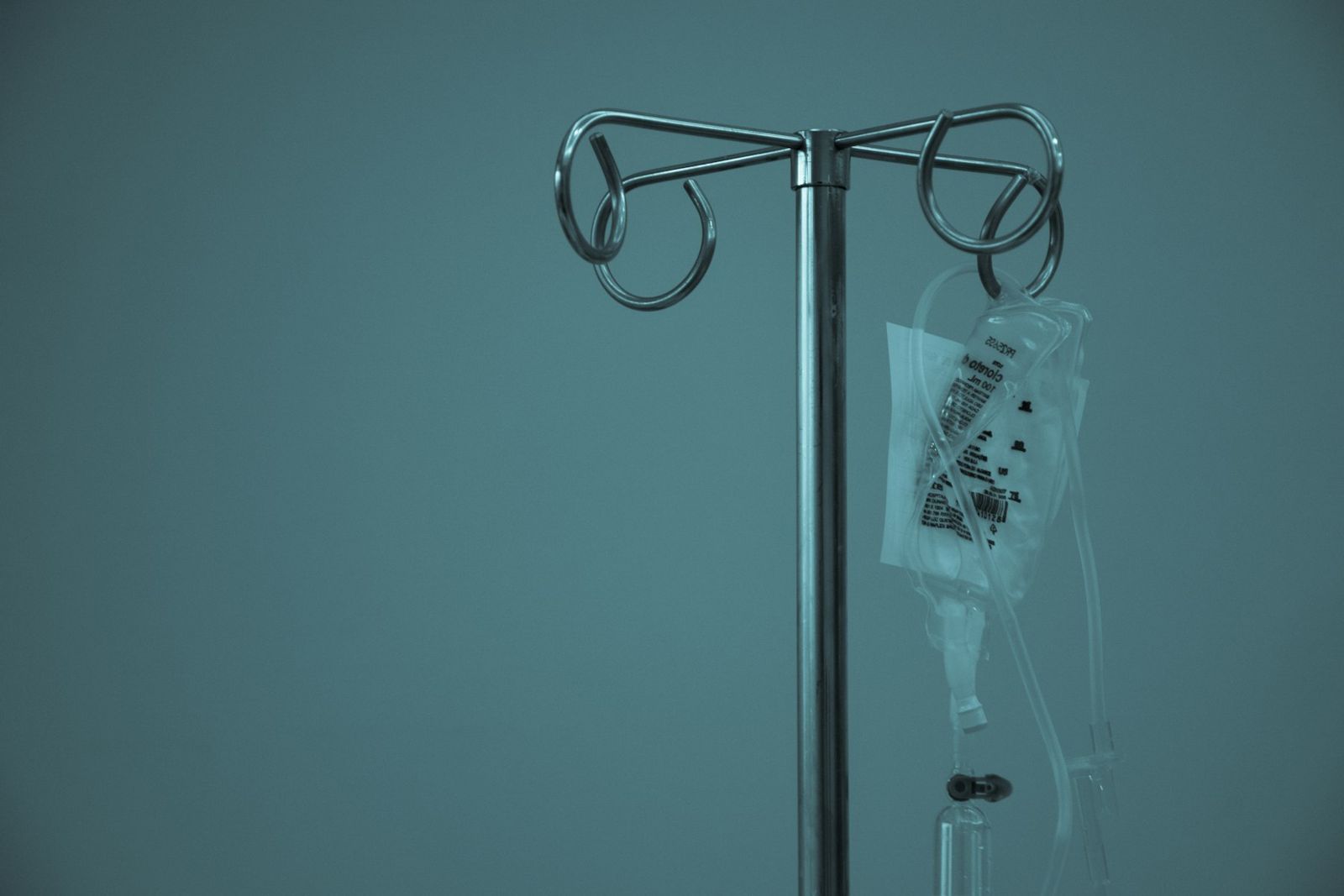 IV drip bag hanging on a stainless steel stand