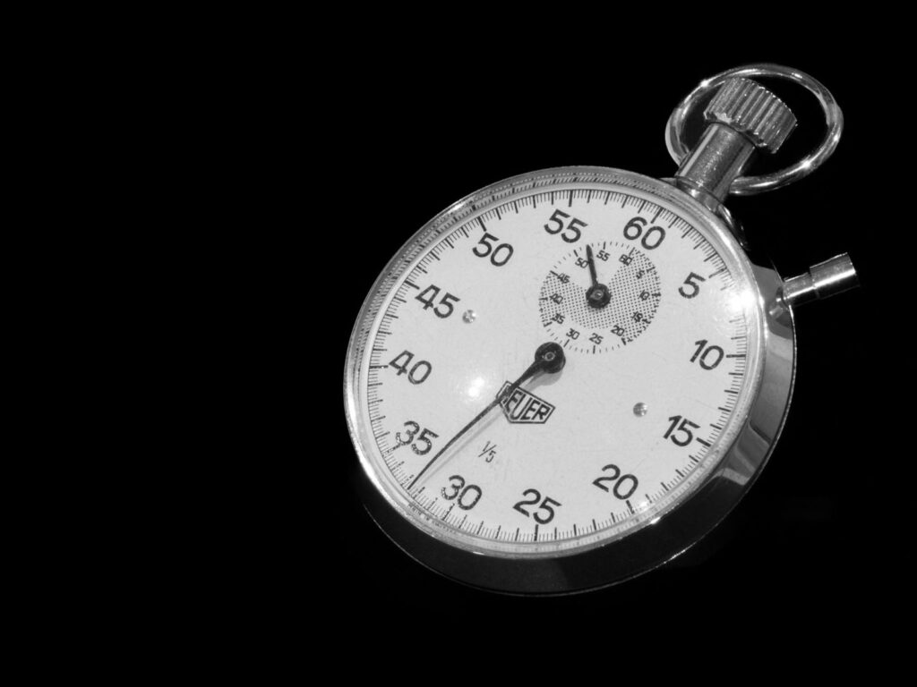 A stopwatch on a black background