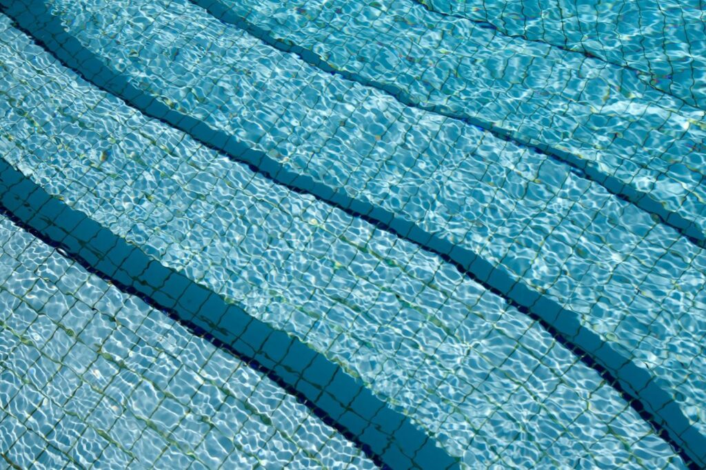Clear blue water in a swimming pool