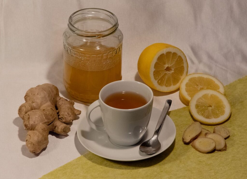 Ginger tea with lemon and fresh ginger root