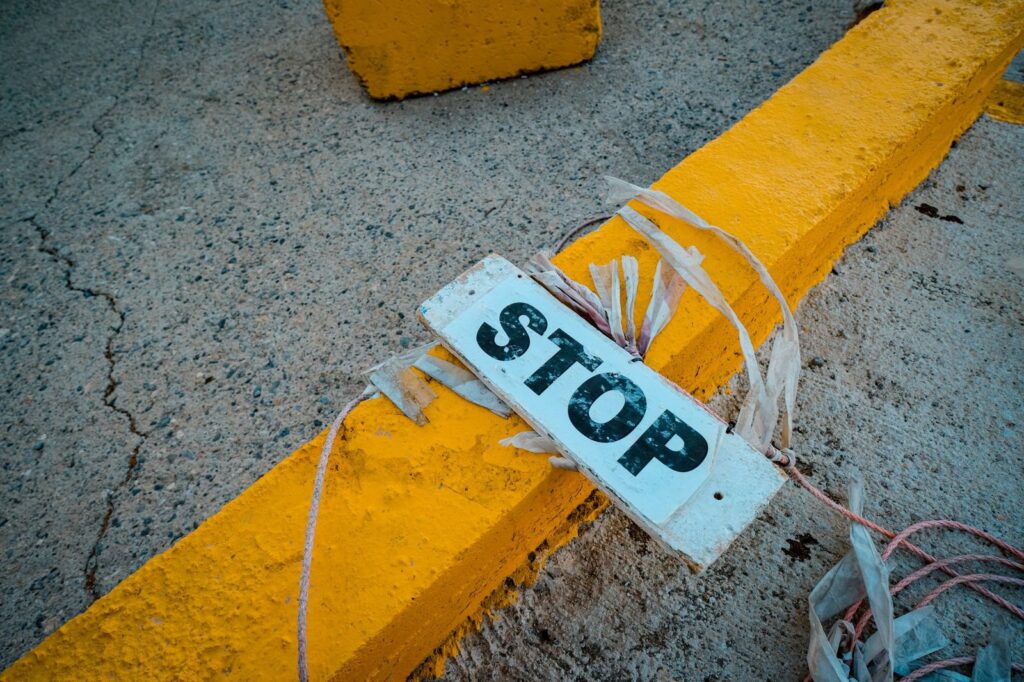 A stop sign on a kerb