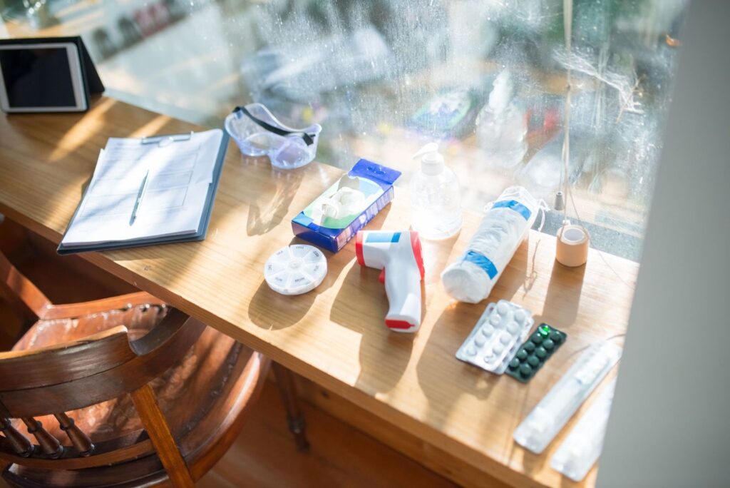 Medicine supplies laid out on a table