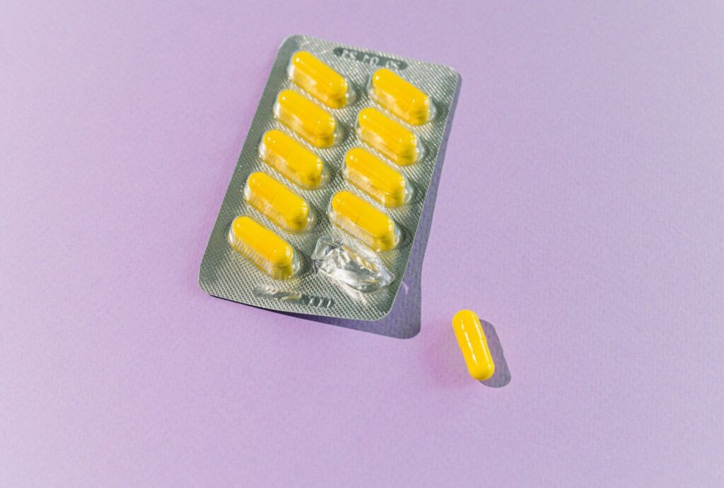 A blister pack of vitamin capsules