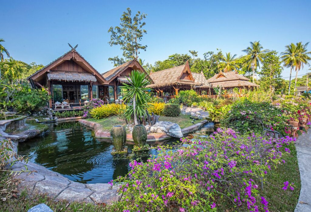 Thatched bungalows in a tropical garden resort