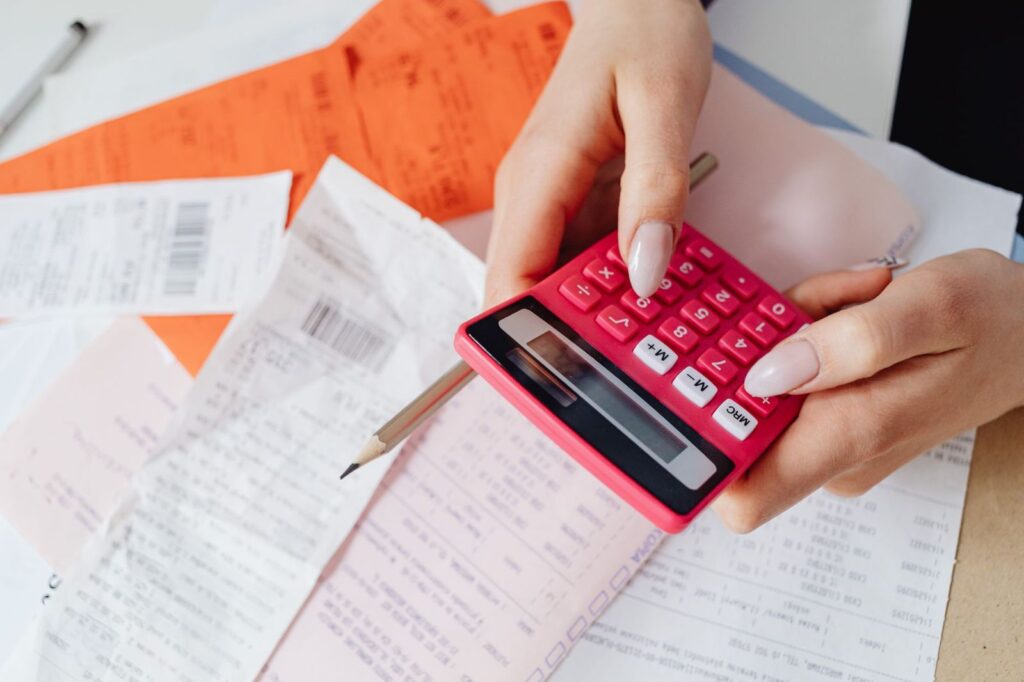 Adding up receipts with a calculator